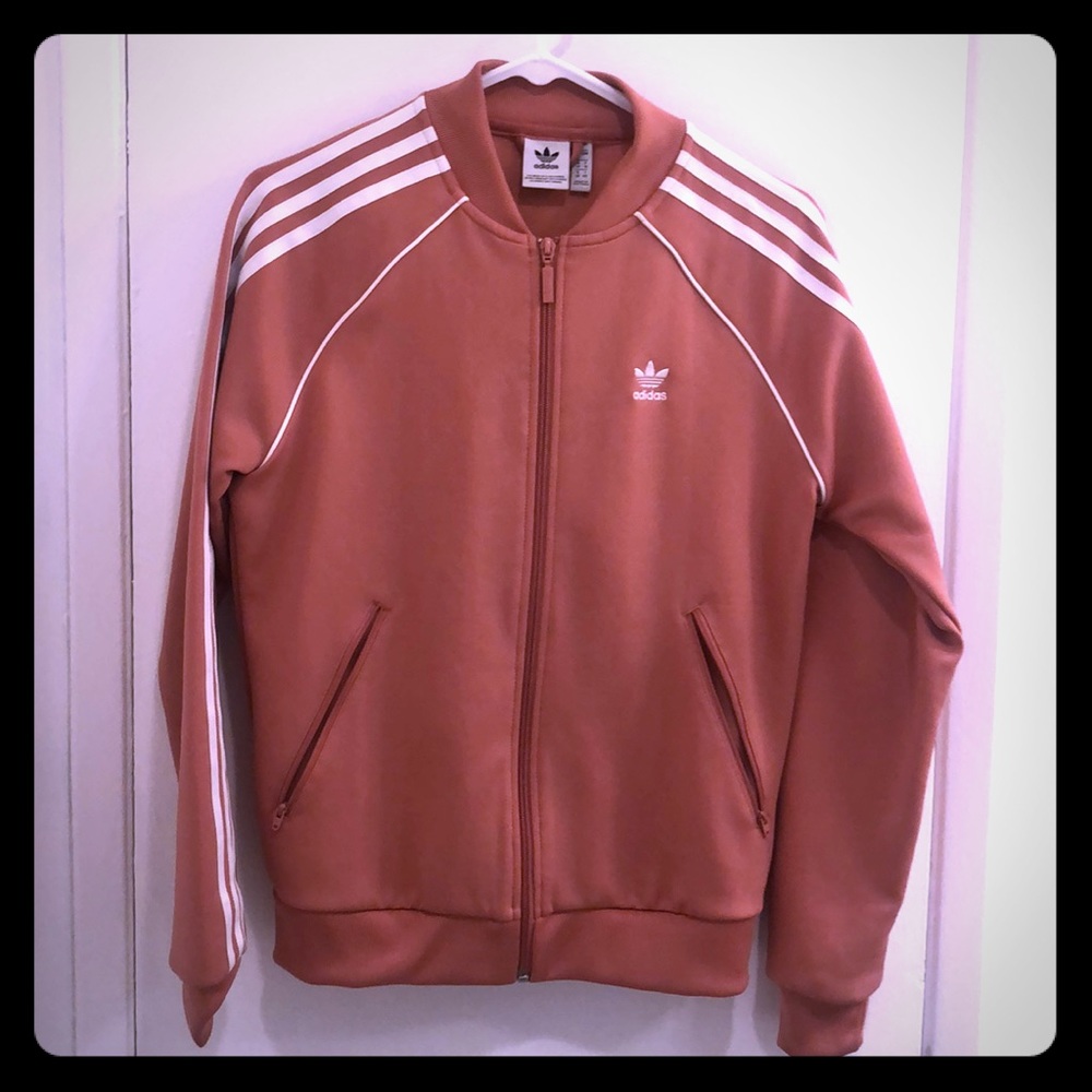 Adidas mauve track jacket.